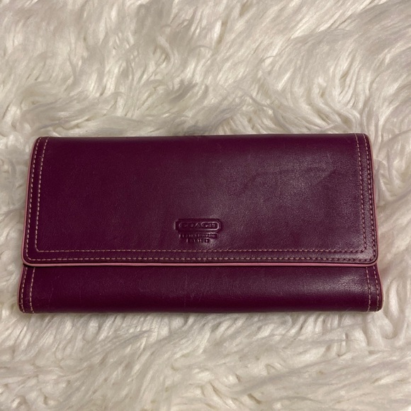 Coach Handbags - COACH Purple Leather Wallet used in good condition size in pictures